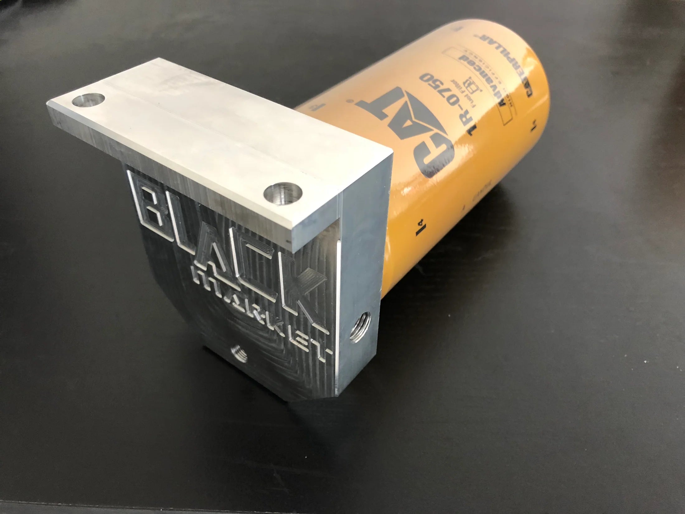 Black Market Performance CUM-FFFA67/59 6.7/5.9 Cummins Cat Fuel Filter Adapter (2003-2024 Cummins)