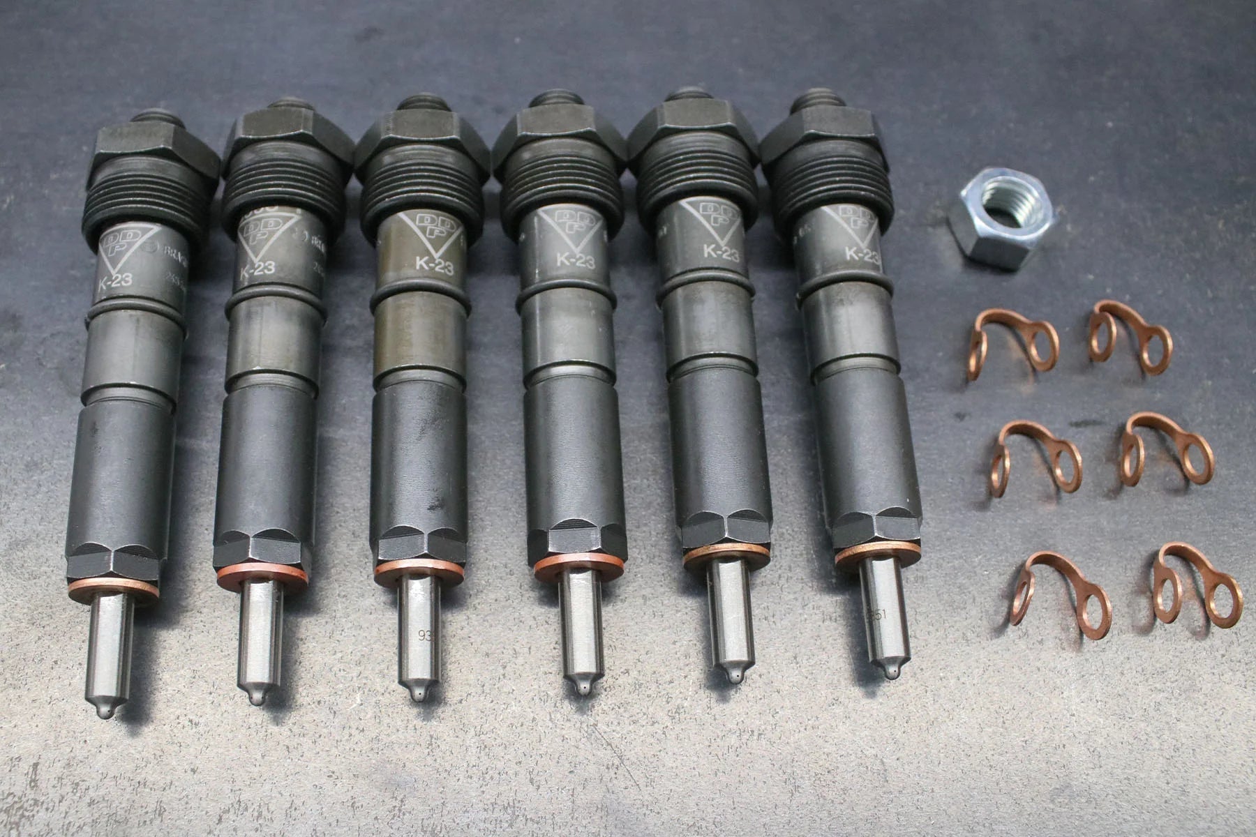 Dynomite Diesel 5.9L 12 Valve Stage Injector Set (1994 - 1998 Cummins) - Southern Diesel Supply