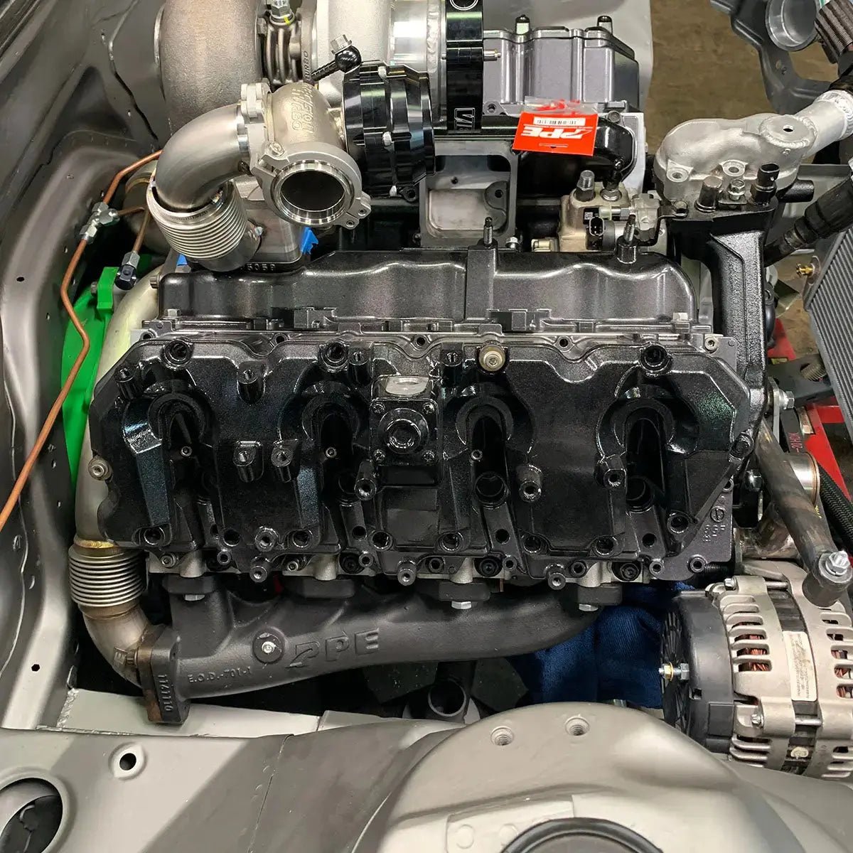 PPE 116111200 High - Flow Exhaust Manifolds with Up - Pipes (2002 - 2004 Duramax CA Emission) - Southern Diesel Supply