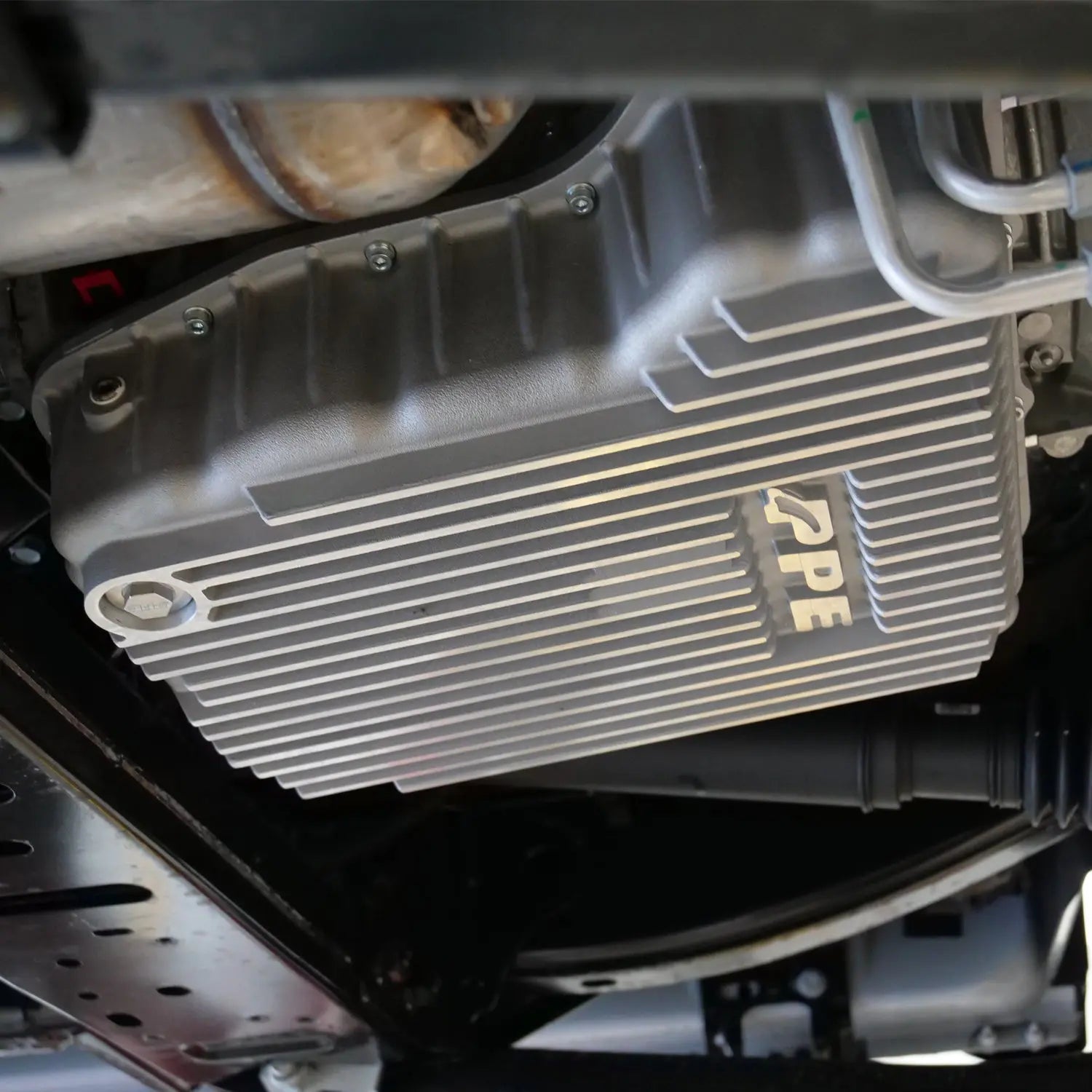 PPE Heavy - Duty Cast Aluminum Flat Bottom 68RFE Transmission Pan (2007.5 - 2024 6.7L Cummins) - Southern Diesel Supply